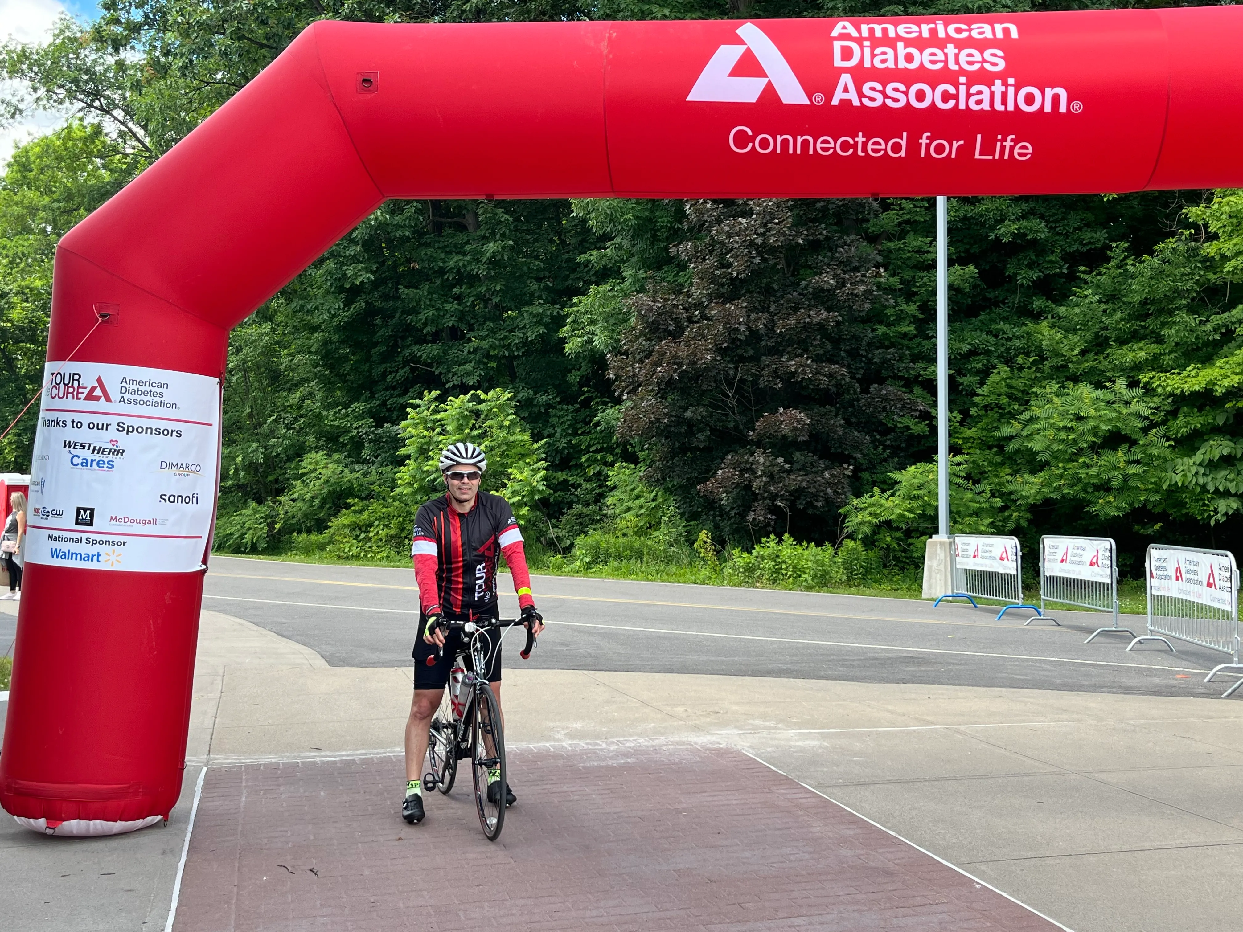 This is me crossing the finish line, last year. The route was long enough and hilly enough that my quads were not happy with me.:)